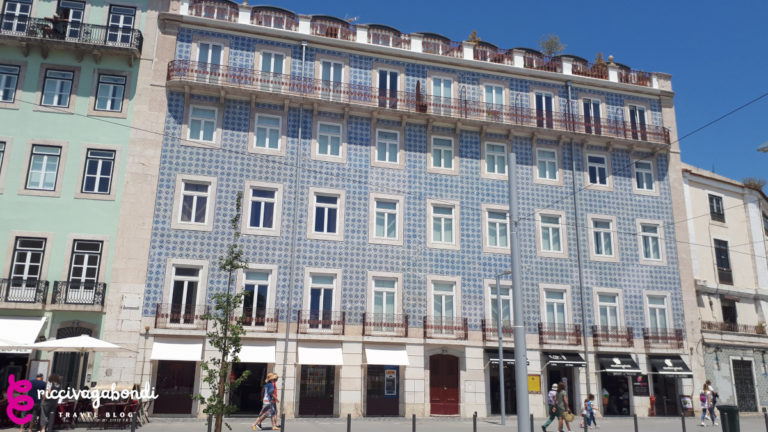 Façade of a building covered in azulejos in Lisbon, Portugal