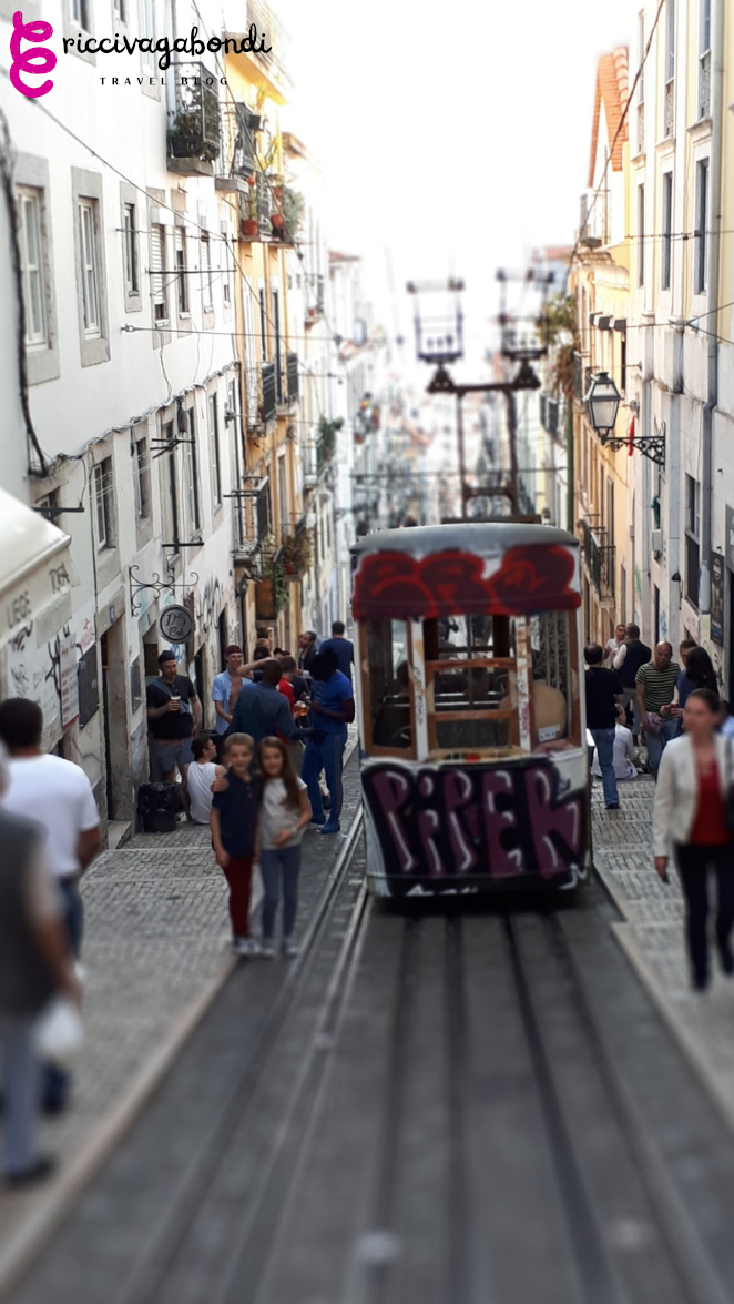 View of the famous yellow tram No. 28 in Lisbon, Portugal
