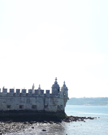 View of Belem Tower and the Tagus river all around in Lisbon, Portugal