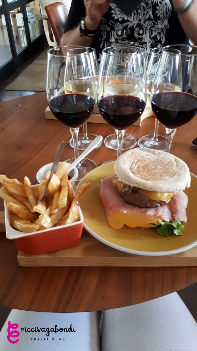 View of a Francesinha served with fries during a wine tasting in Porto, Portugal