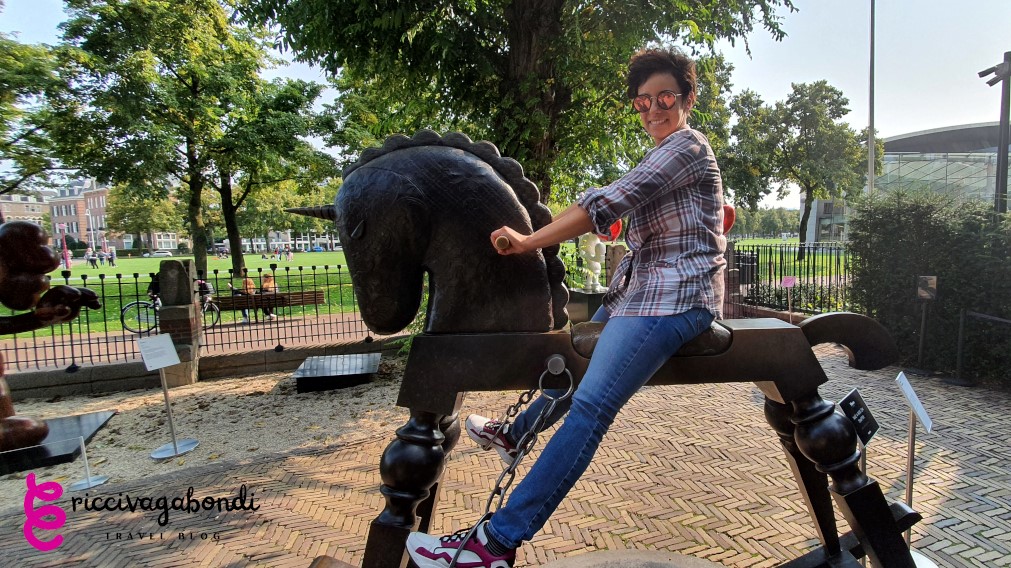 View of riccivagabondi riding an iron horse in Amsterdam