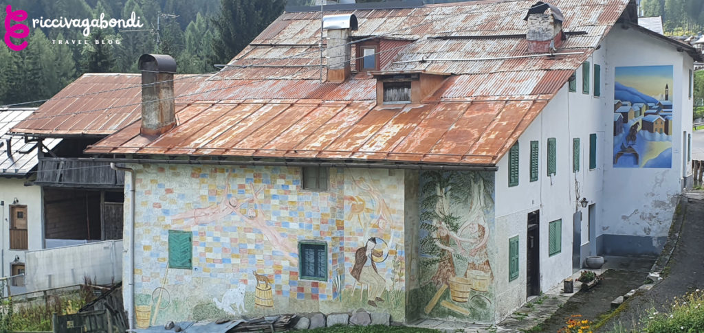 View of buildings with murals on them, Cibiana di Cadore, Italy
