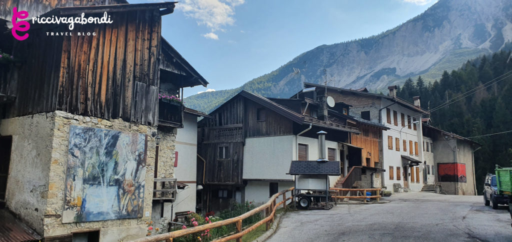 Murals and wooden mountain houses in Cibiana di Cadore, Dolomites, Italy