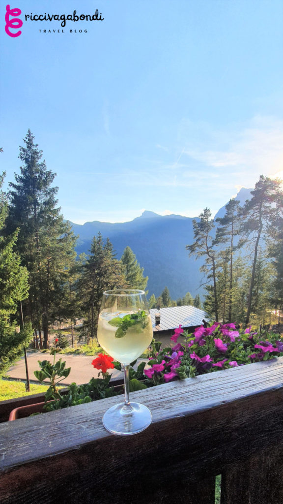 View of an Italian aperitif with Alps in the back on a sunny day