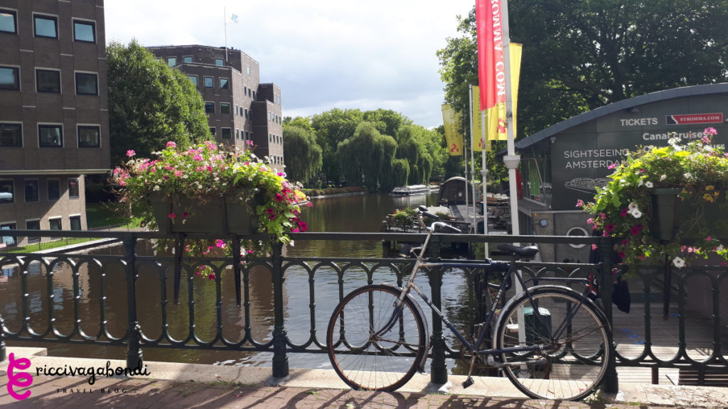 View of a bike parked on a bridge in Amsterdam, Netherlands