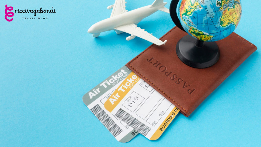 Passport, travel ticket, globe map and a small plane in white