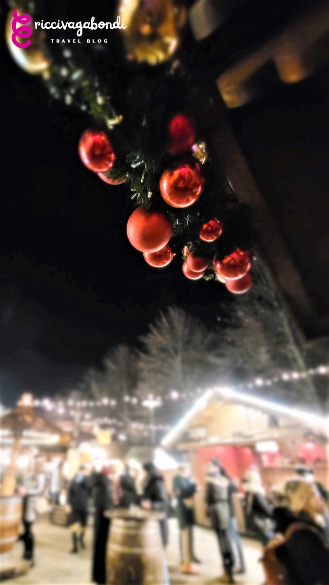 View of a German wooden Christmas market at night time