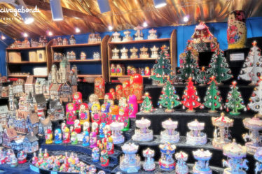 View of a Christmas market stand with wooden decoration and toys of all kinds