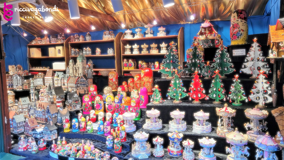 View of a Christmas market stand with wooden decoration and toys of all kinds