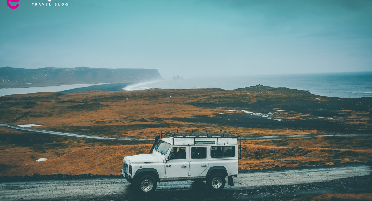 View of a jeep travelling around Island on a rainy day
