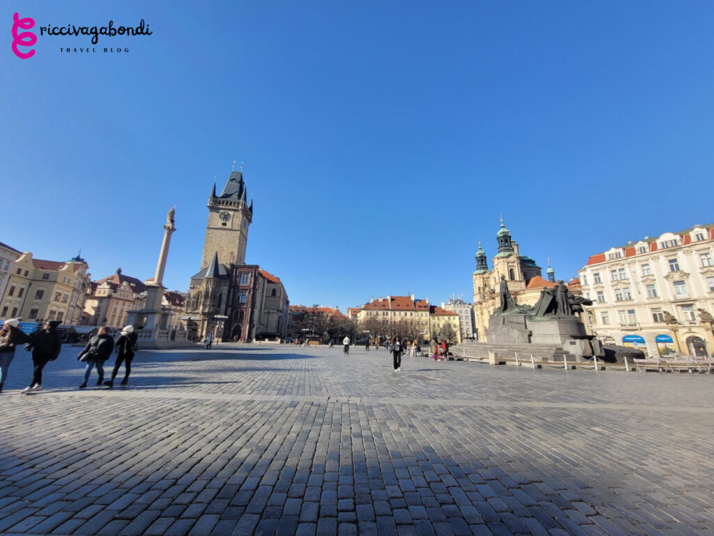 Approaching the Old town square in Prague at day time with few tourists around