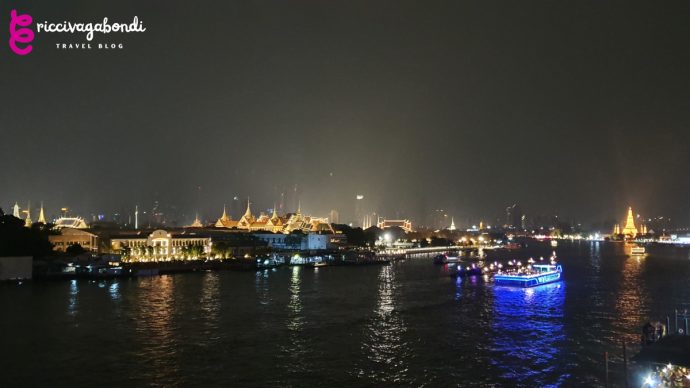 Night view of Bangkok with temples on the background
